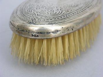 Lot - Tiffany & Co silver crumb brush