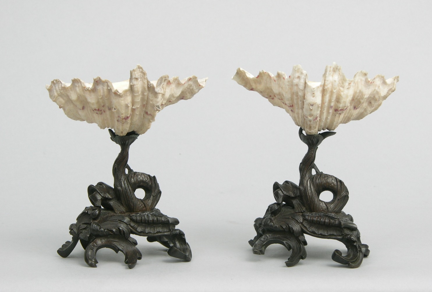 A Pair of Saltwater Shells on Figural Metal Bases , 09.16.06, Sold: $540.5