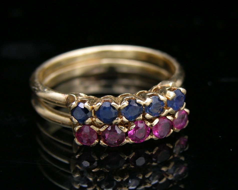 A Pair of Gold Guard Rings with Sapphires and Rubies , 05.17.07, Sold 69