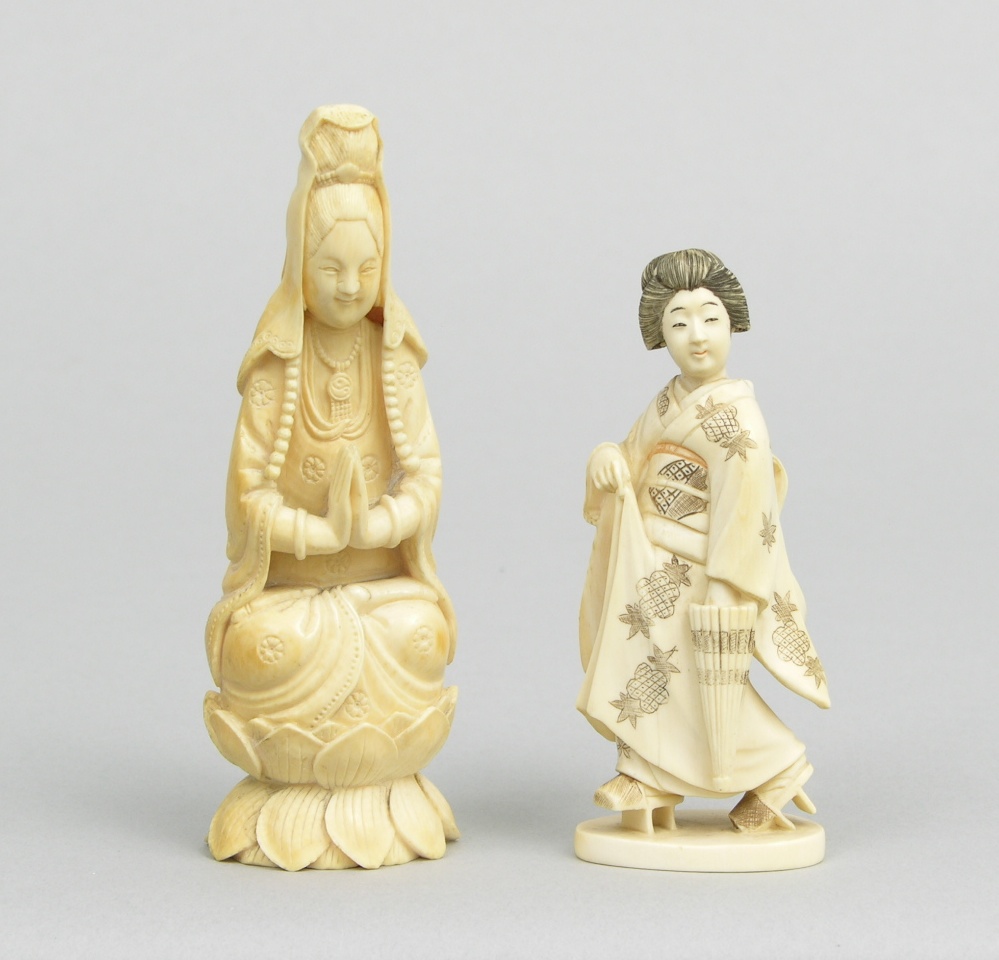 small carved ivory figurines