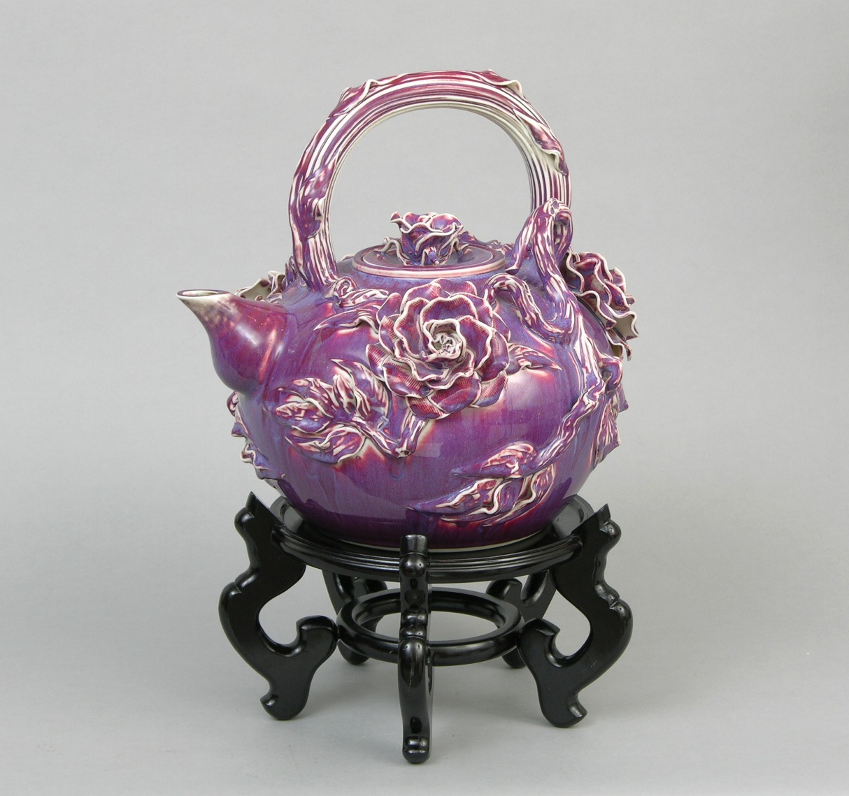 A Large Decorative Glazed Porcelain Teapot on Stand, 11.16.07, Sold 241.5