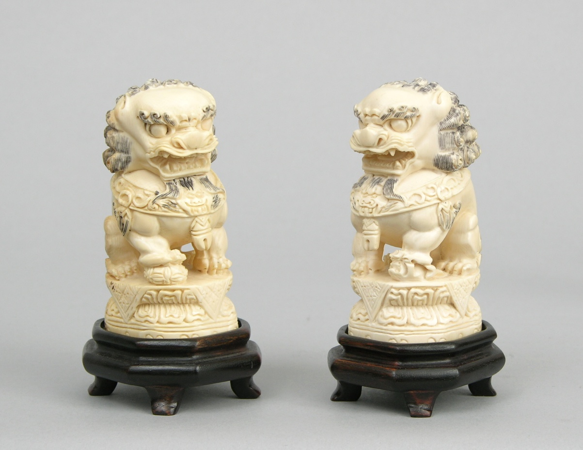A Pair of Carved Ivory Foo Dogs , 09.21.07, Sold 276