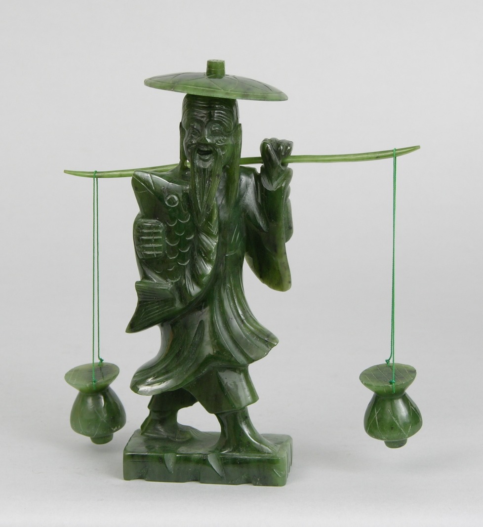 A Carved Jade Figurine of a Fisherman , 11.22.08, Sold 92