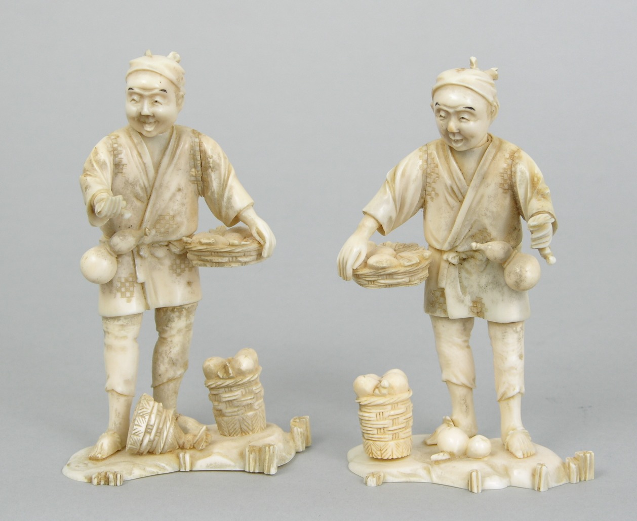 A Pair of Carved Ivory Figurines, 09.13.08, Sold 120.75