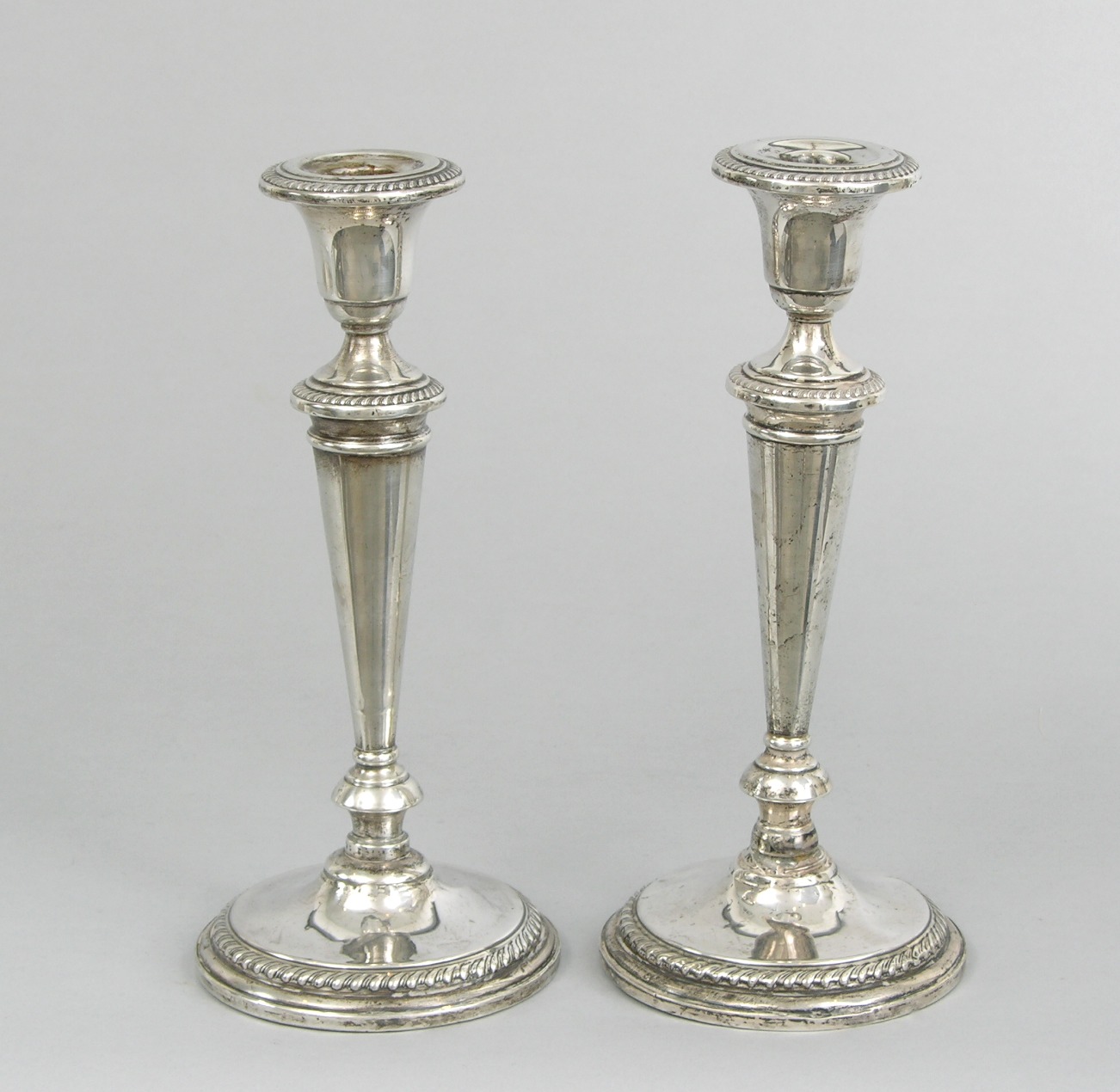 A Pair of Weighted Sterling Silver Candlesticks, 09.12.08, Sold 92