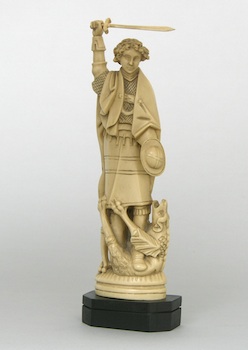 A Continental Carved Ivory Figurine of St. George and the Dragon