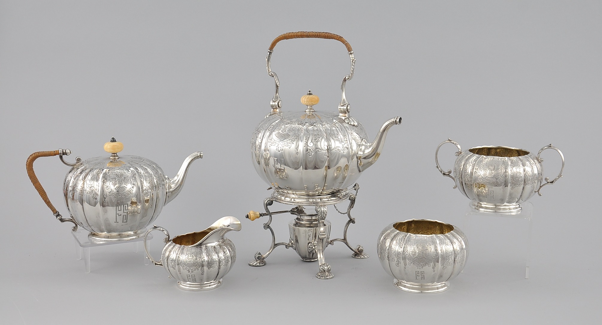 A Sterling Silver Five Piece Tea Set by Marcus & Co, and William B