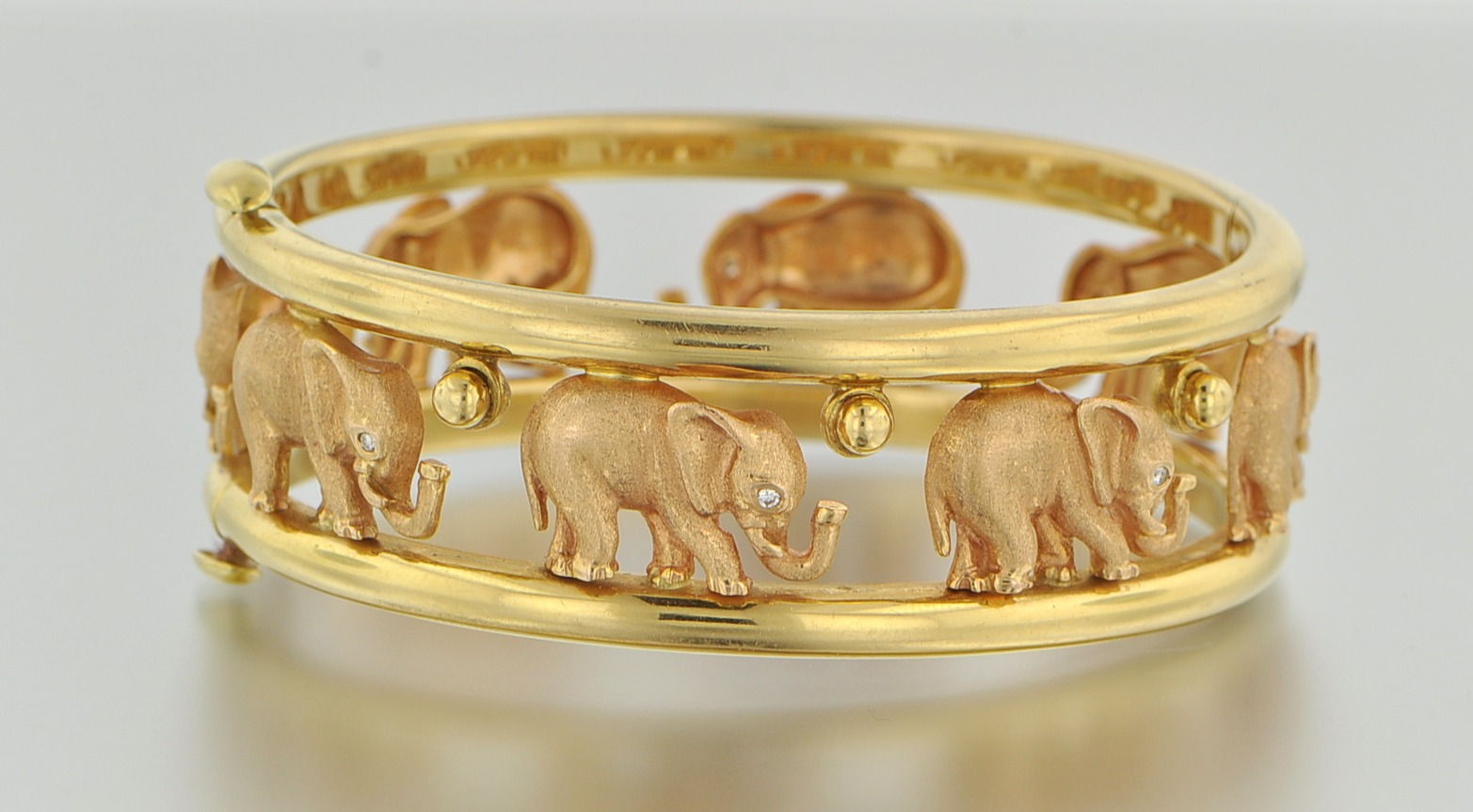 An 18k Gold and Diamond Elephant Design Bracelet , 11.20.09, Sold 1955
