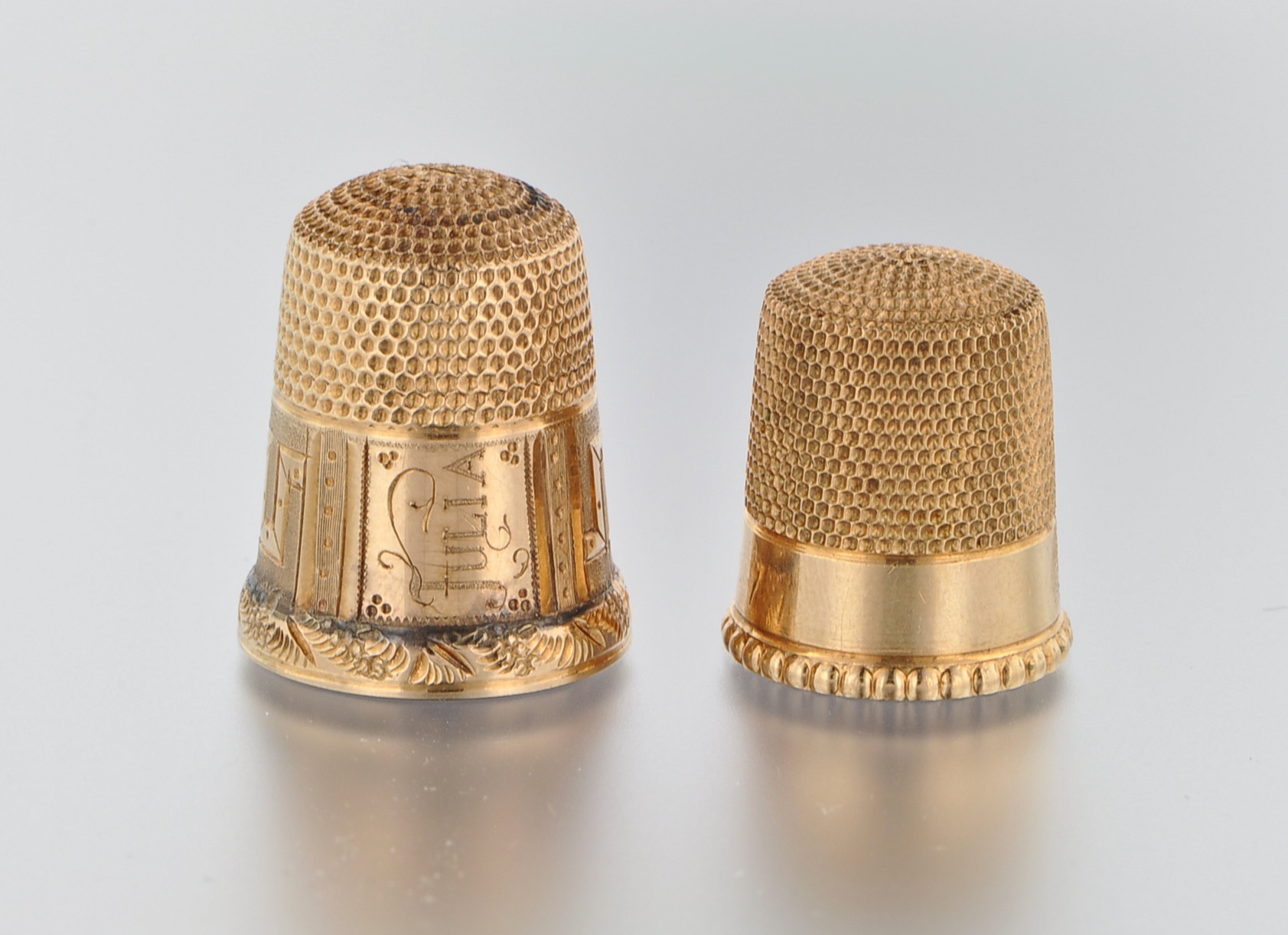 A Lot of Two Gold Thimbles , 09.25.09, Sold 184