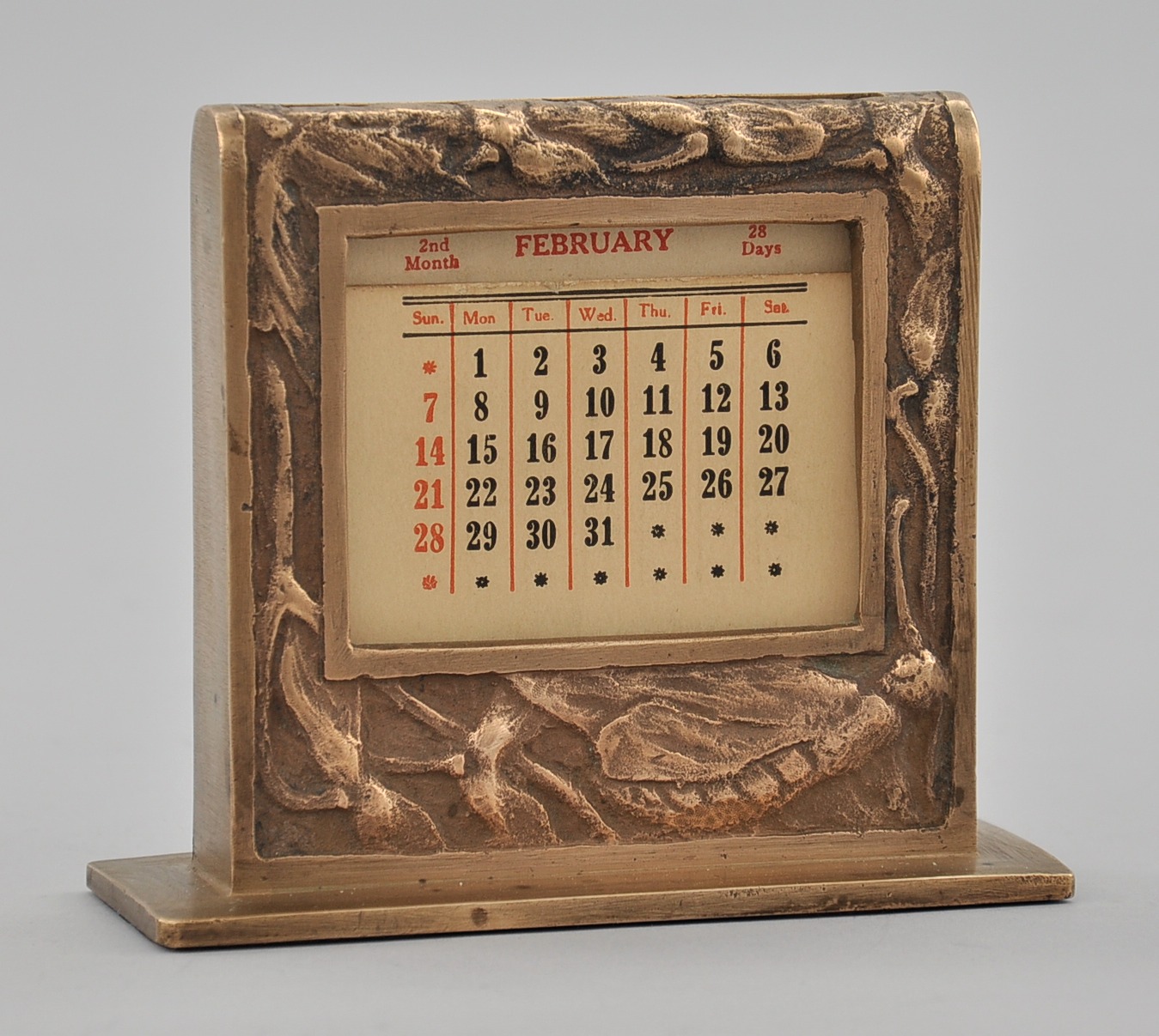 A Cast Bronze Perpetual Desktop Calendar by Potter Studios, 03.06.10