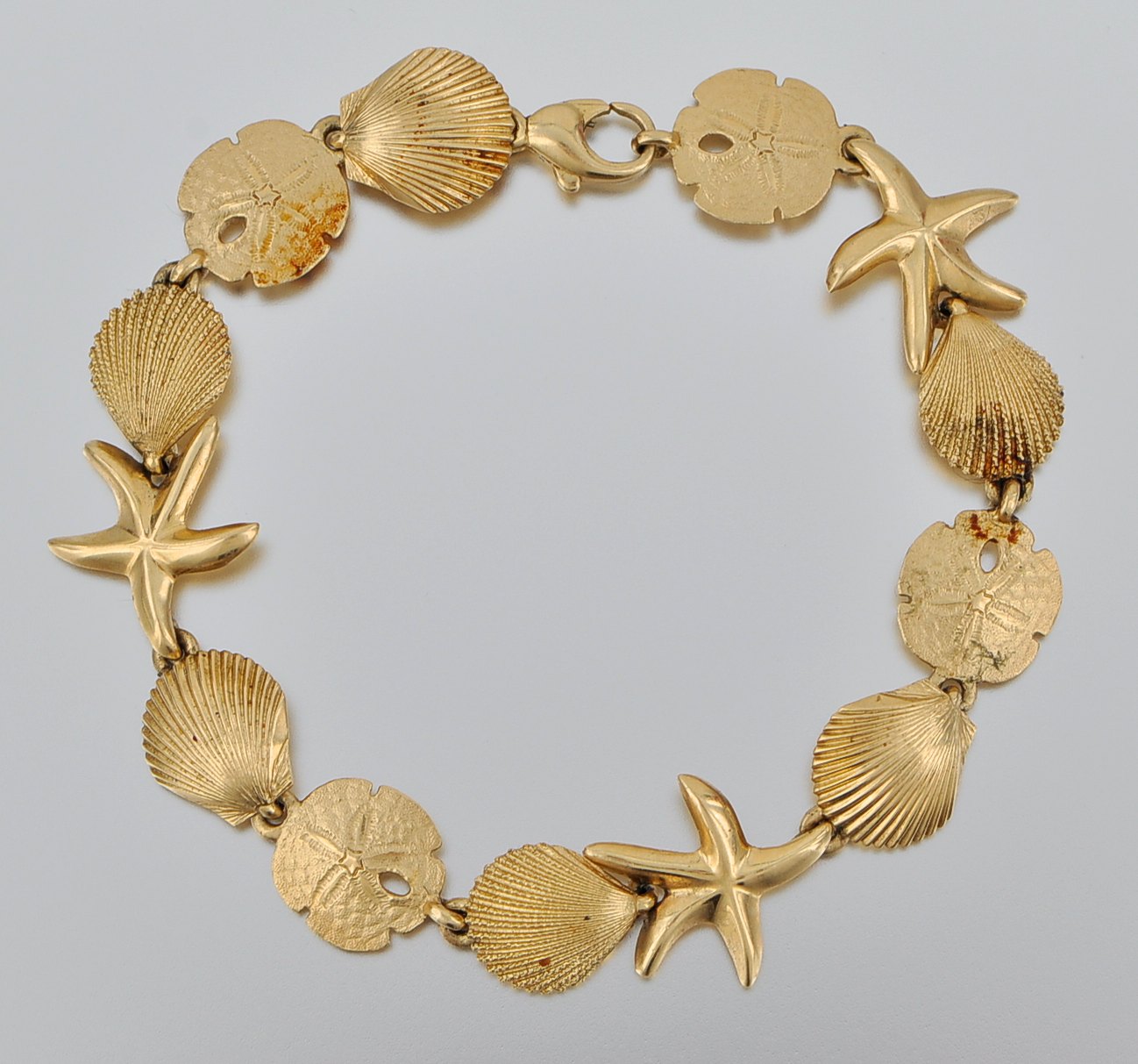 A Ladies' 14k Gold Aquatic Design Bracelet , 05.21.10, Sold: $368