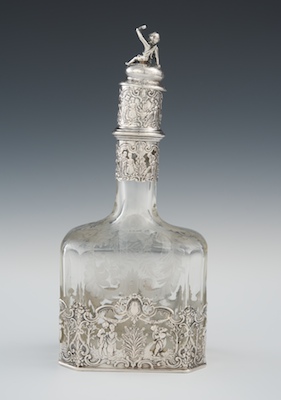A German Silver Mounted Etched Crystal Wine Decanter by Storck & Sinsheimer, Hanau, Late 19th Century | Sold for $724.50