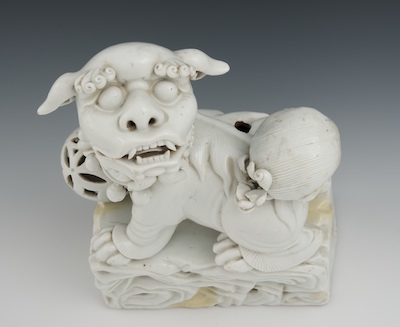A Chinese Porcelain Blanc-de-Chine Foo Lion, Early Qing, Kangxi Period