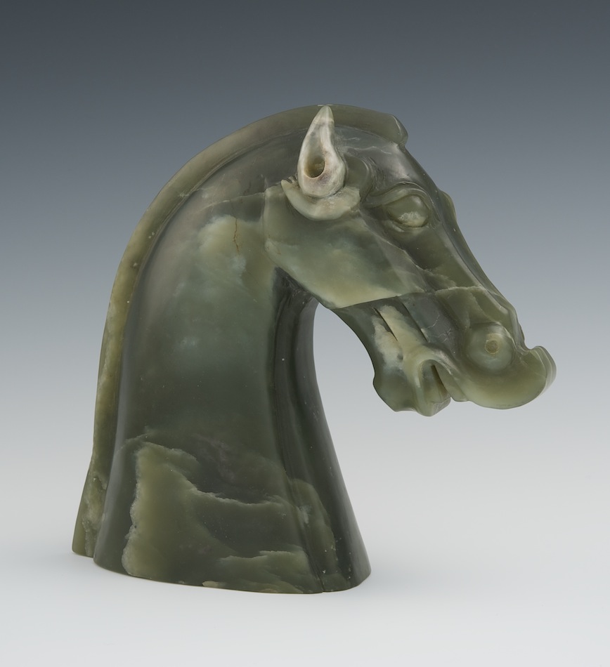 A Carved Spinach Jade Horse Head, 05.28.11, Sold 598