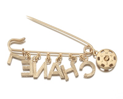 1221. Chanel Costume Jewelry Safety Pin Brooch With Lucky Charms - March  2014 - ASPIRE AUCTIONS