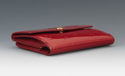 Sold at Auction: Louis Vuitton: Rouge Fauviste, Monogram Embossed Burgundy  Vernis Patent Leather Zip Wallet