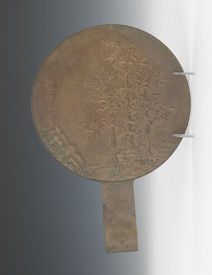 bronze hand mirror