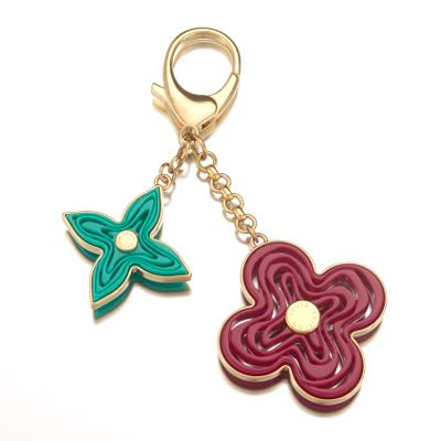 Sold at Auction: Louis Vuitton, Louis Vuitton Pink & red flower bag charm