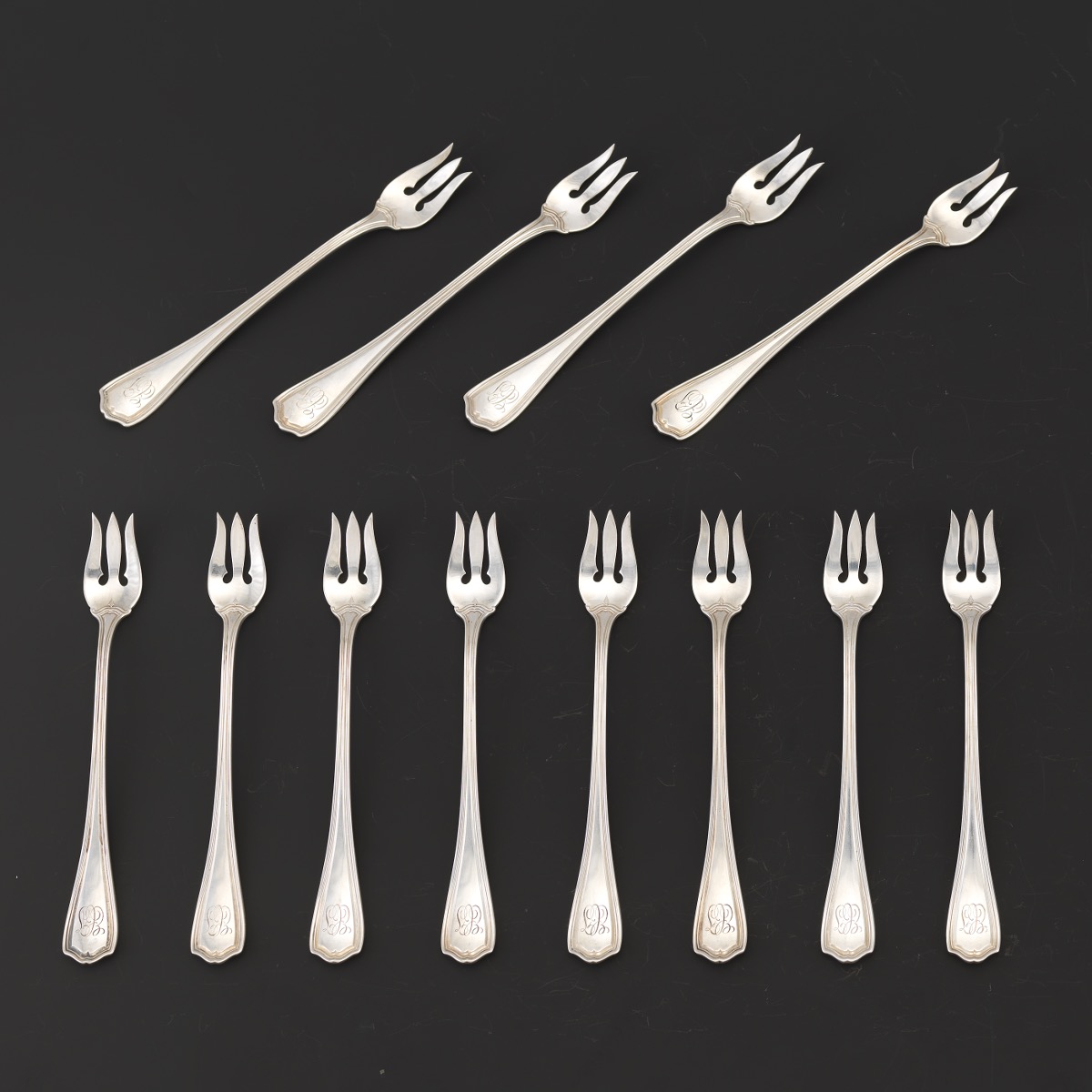 Twelve Reed & Barton Sterling Silver Cocktail Forks, Retailed by J.C