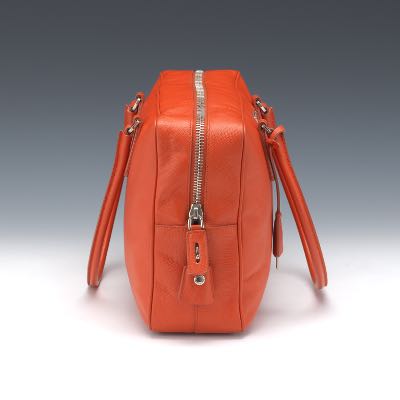 Sold at Auction: A PRADA BAULETTO HANDBAG